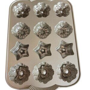 Nordic Ware Holiday Mini Muffin Pan 4 Different patterns star, wreath, Trees